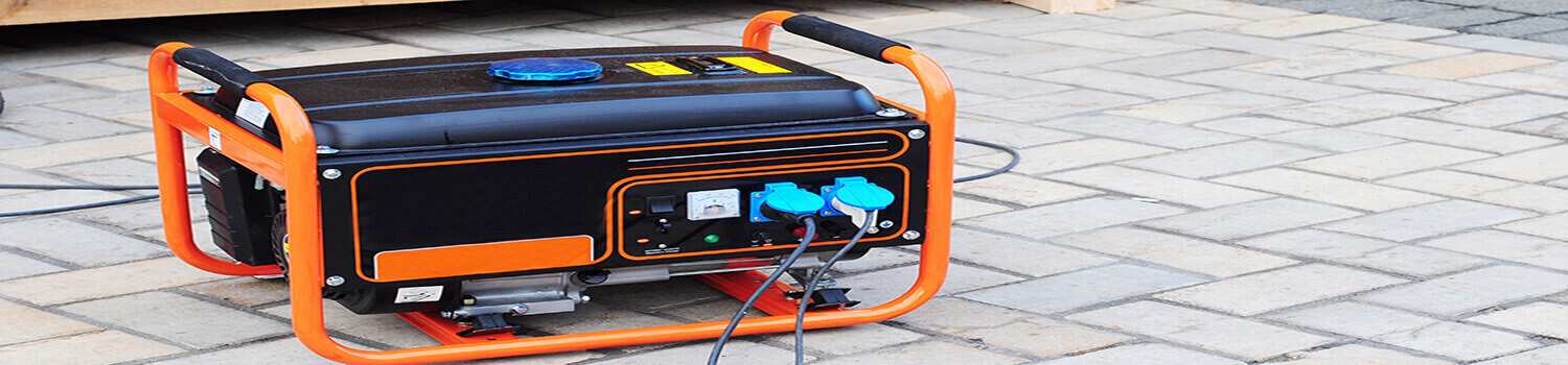 Gasoline Portable Generator on the House Construction Site. Cl