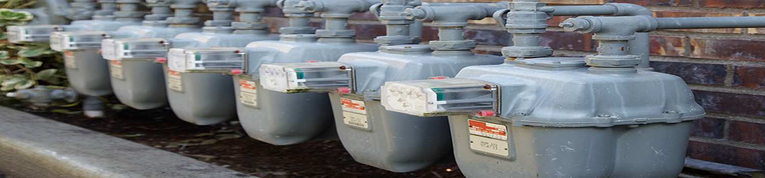 Row of gas meters with full manifolding