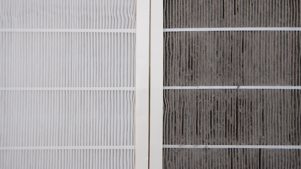 Changing your furnace filter is easy to do. Photo shows new air filter compared to old dirty air filter. 