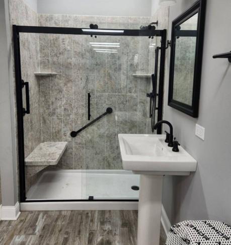 A new bathroom features a grab bar.