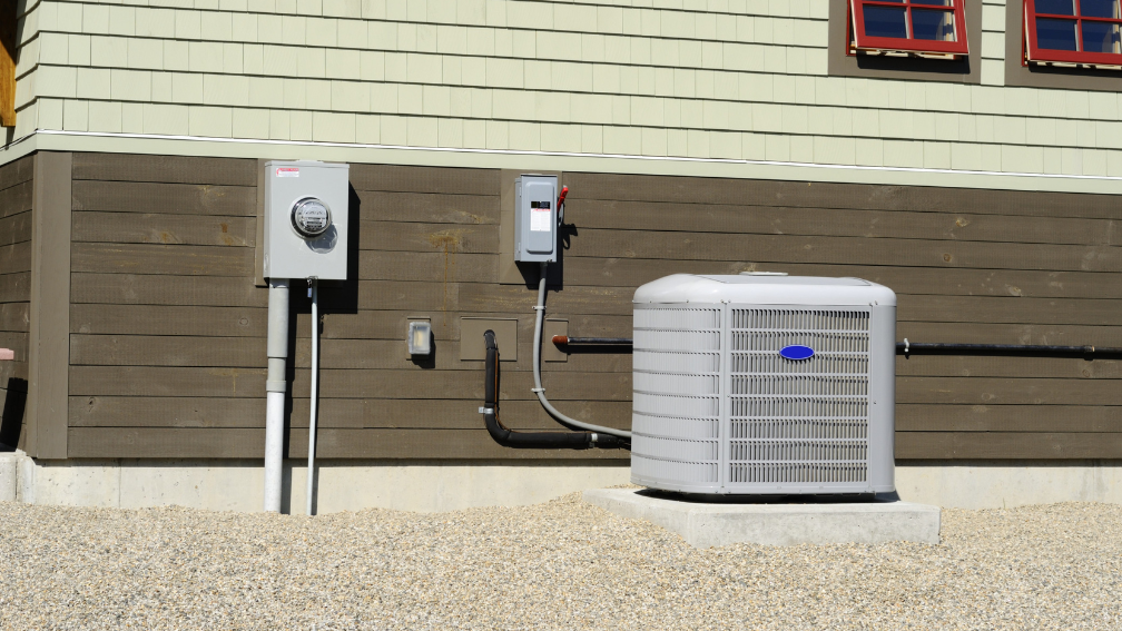 AC unit is shown next to a house.
