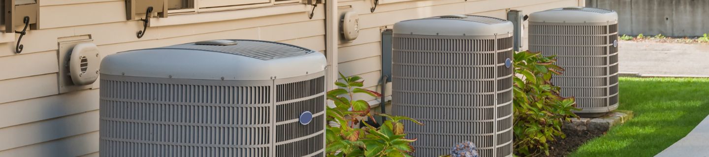 AC units sit side by side. Homeowners can depend on the Aero Energy SafeGuard Tune-Up