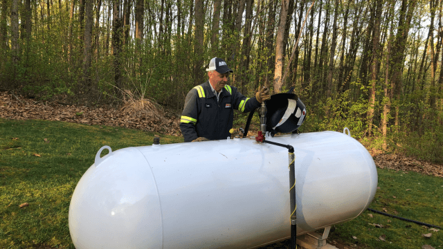 Aero Energy driver fills a propane tank.