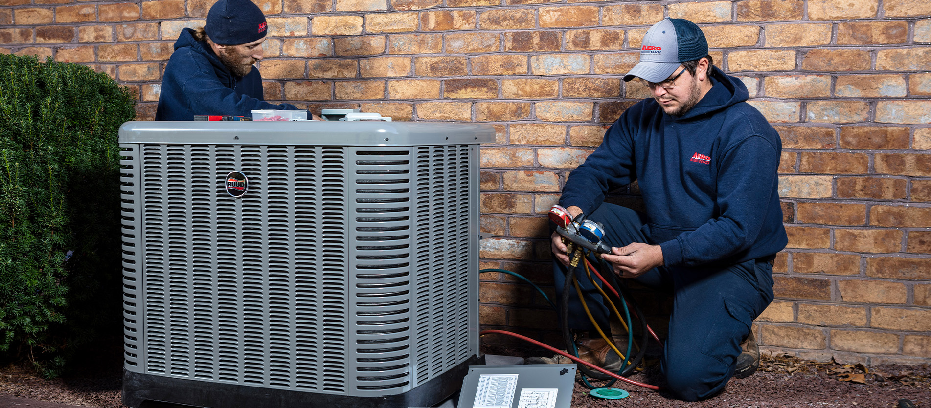 Aero Energy technicians install an HVAC system.