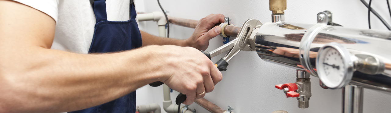 man installing the heater system in the house