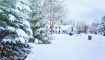 House is featured covered in snow.